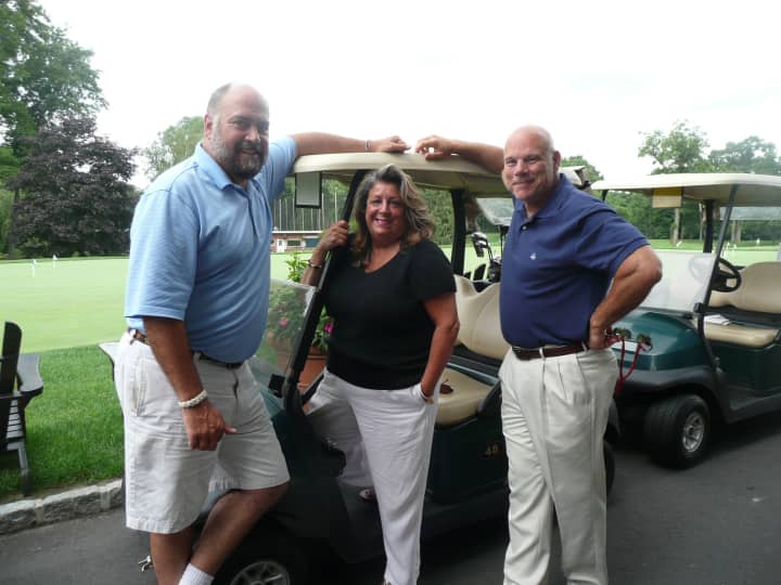 Golf Committee Chair Nick Lee, Fairfield County Bank Vice President Carol Johnson, and Frank Rowella of Reynolds and Rowella.