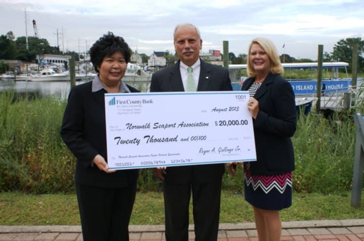 From left to right: Irene Dixon, President Norwalk Seaport Association, Reyno A. Giallongo, Chairman and CEO First County Bank, Katherine Harris, President and COO First County Bank.