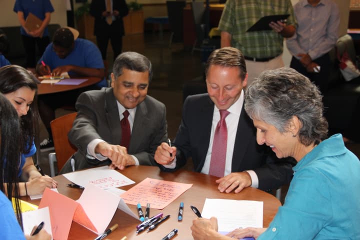 County Executive Robert Astorino and others wrote thank you notes to soldiers and police officers at Pace University.