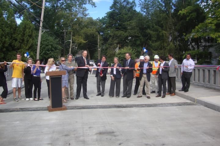 Rye Mayor Doug French, along with neighbors, city council members and officials from the Department of Transportation, cut the ribbon on the Central Avenue bridge.