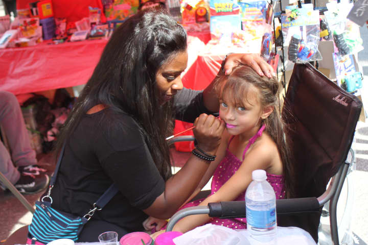 A local girl gets her face painted at last year&#x27;s Yonkers Riverfest.