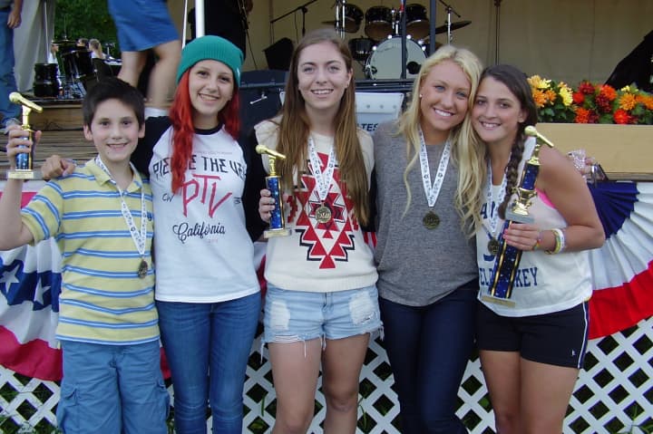From left, Thomas Dalceredo, Taylor Headrick, Kristyn Hatley, Kayla Lonergan, and Becca Thompson show their Yorktown Grange Fair karaoke contest trophies.