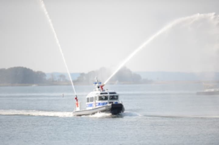 The Greenwich Police Department&#x27;s new public safety vessel speeds through Greenwich Harbor at its recent commissioning ceremony.
