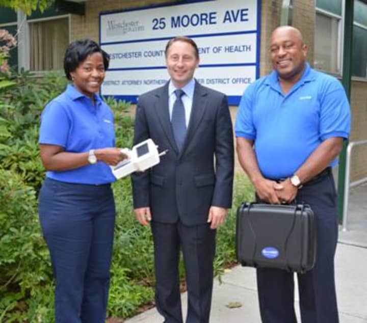 County Executive Robert Astorino recently helped Mount Vernon&#x27;s James White, right, and his company grow their client base. 