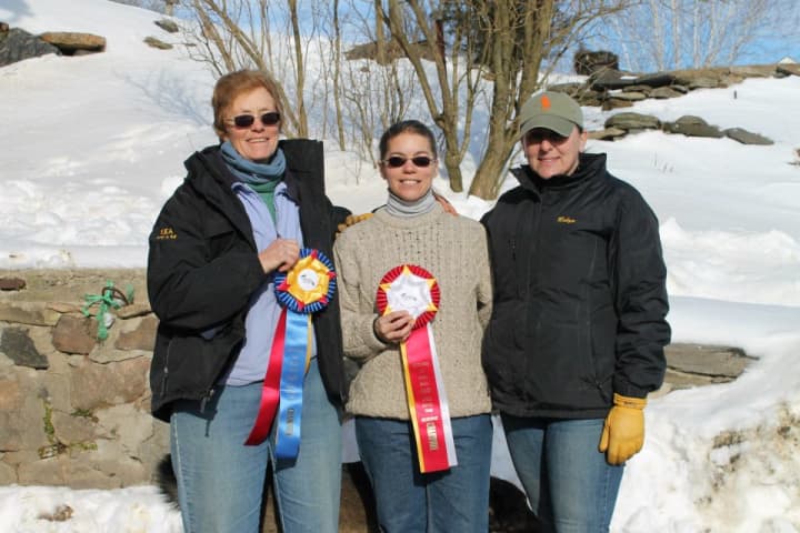 Barbara Lindsay, left, stands with Callie Bauer and Robyn Musicant, who are also coaches in the Interscholastic Equestrian Association. 