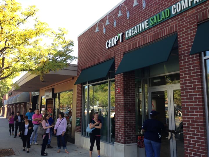 Dozens of residents waited in line to get a free salad Wednesday afternoon. 