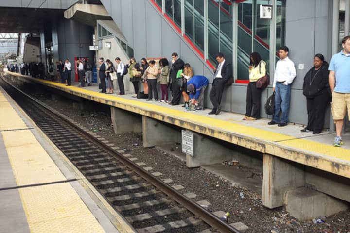 Metro-North commuters line the Stamford train station platform.