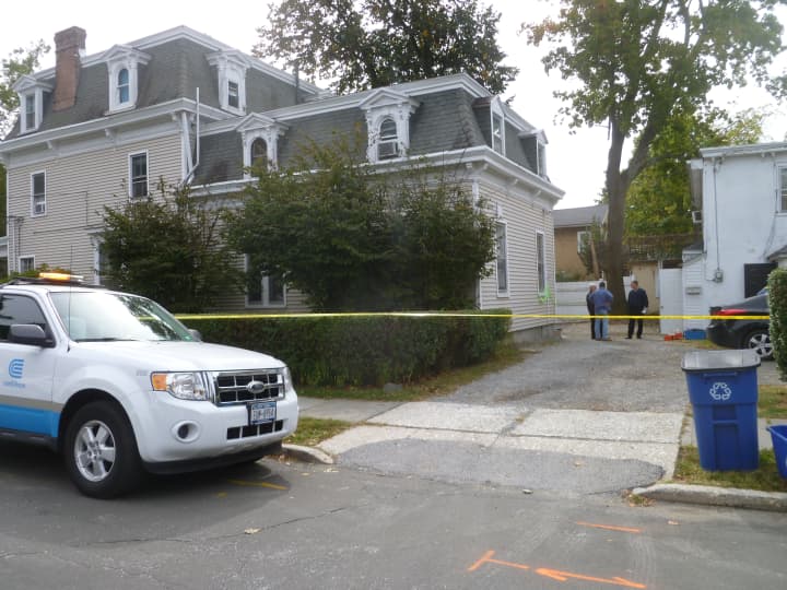 Police and Con Ed on the scene at a house in Tarrytown, where a woman was found dead after reports of a gas leak.