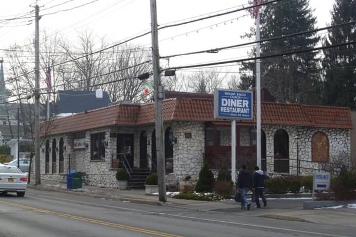 The newspaper racks in front of the Mount Kisco Coach Diner are at the center of the dispute between rivals newspapers The Examiner and Hudson Valley Reporter.