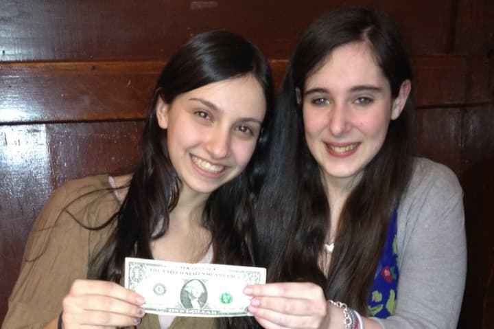 Arielle Joselson of Mamaroneck, left, and Seri Roth of Suffern, classmates at Solomon Schechter Westchester School in Hartsdale, hope their charity, A Dollar Campaign, can help beat pediatric cancer. 
