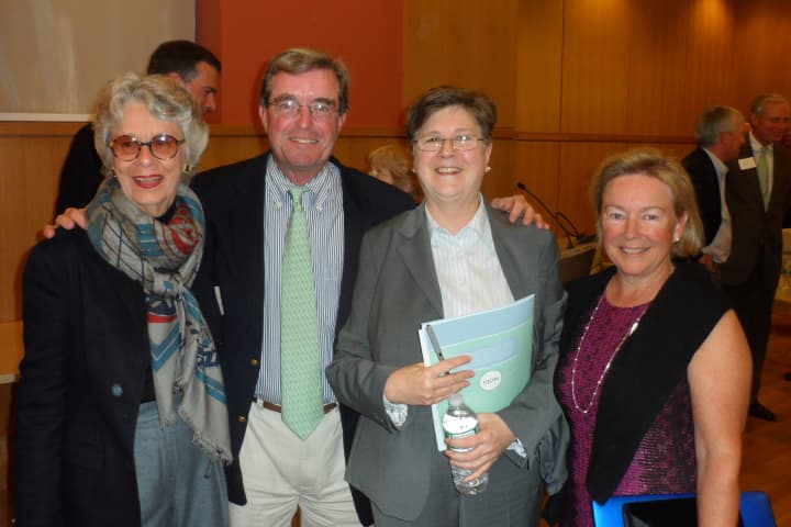 Louise Berry, second from right, the outgoing director of Darien Library, talks with (left to right) Ann Manel, George Wyper and Amy Cholnoky.