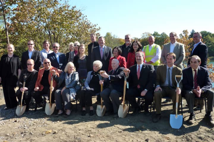 Westport politicians join Levitt Pavilion officials, supporters and construction team members to celebrate the start of construction on a new pavilion in a ground breaking ceremony Monday.