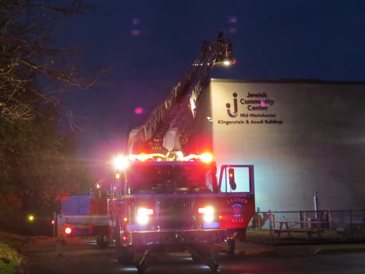 Fire officials from New Rochelle are on the scene of a fire at the JCC of Mid-Westchester at Wilmot Road in Scarsdale.
