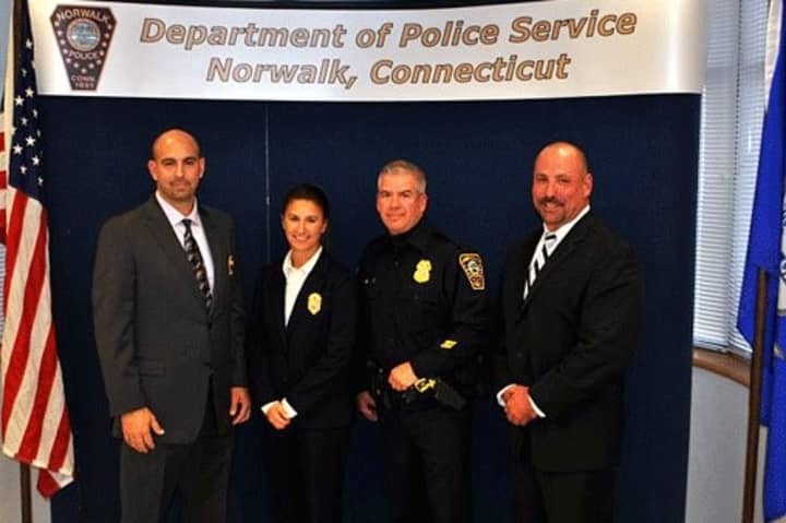 Four Norwalk police officers were promoted recently in a ceremony. From left are Det. John Taranto, Lt. Melissa Lepore, Sgt. Greg Scully and Sgt. Alex Tolnay. 