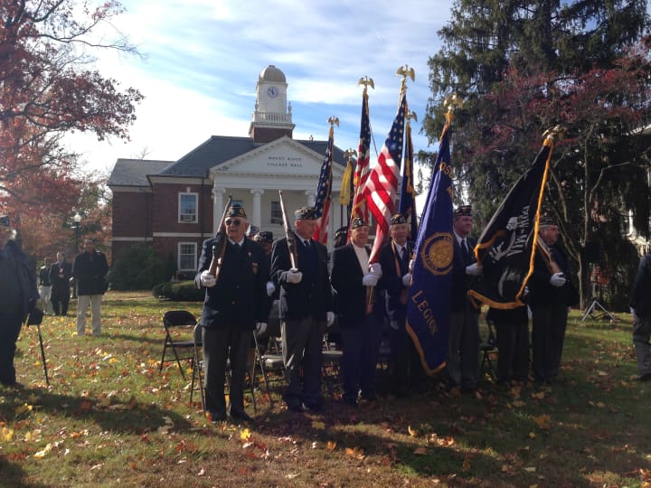 Dozens of residents joined American Legion, town and county officials to pay their respect to local veterans.