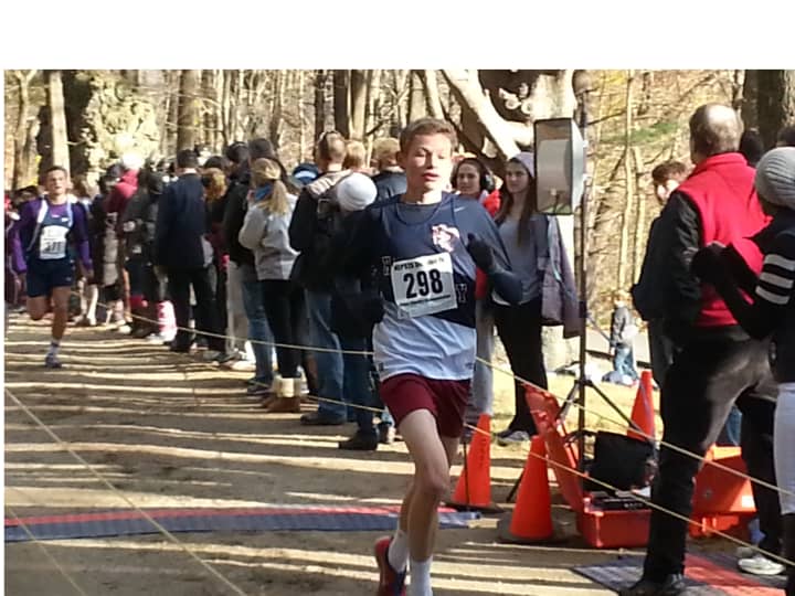 Sam Mackiewicz of The Harvey School hits the finish line at Saturday&#x27;s race.