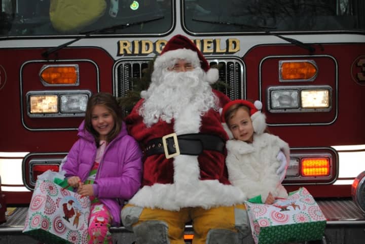 Brooke and Ava Manganiello received a surprise visit from Santa in 2012