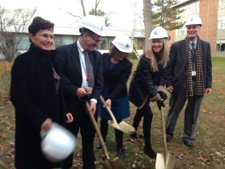 Groner, second from the right, was joined by Superintendent Jere Hochman, right, and school board President Susan Wollin, left, and others for the groundbreaking Thursday.