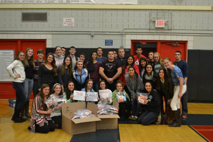 Eastchester student athletes recently shipped out supplies and letters to soldiers overseas as a part of the school&#x27;s new program known as The Eagle Impact. 