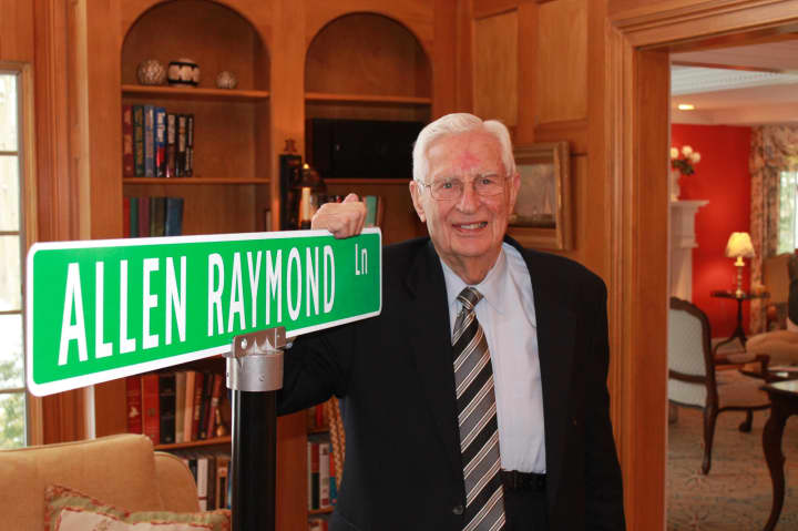 Westport&#x27;s Allen Raymond with his sign, first presented to him at his 89th birthday party last January.
