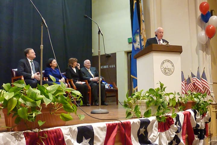 Jim Marpe, Westport&#x27;s new first selectman, addresses hundreds gathered at Town Hall Monday night after he was sworn into office.