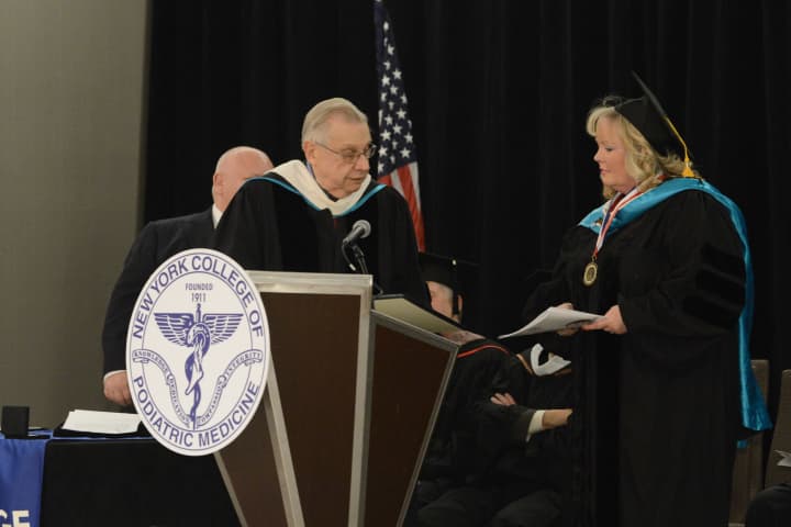 Armonk resident Dr. Kathleen Reilly Fallon receives an honorary doctorate. 