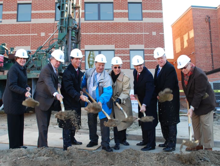 Hospital officials participate in a ceremonial ground breaking at Phelps Memorial Hospital Center recently. 