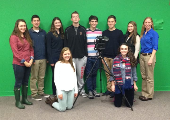 The North Salem seniors, and faculty advisor Cynthia Sandler, who produce the weekly TGI Tiger News show, back row, from left: Sara Goldstein, Daniel Selzer, Cecilia Heffernan, Tom Bond, Kevin Aruilio, Matthew Tessler, Kelly Gilbert and Sandler.