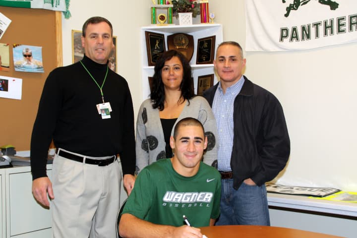 Anthony Godino was joined by his parents and Pleasantville Athletic Director John Bauerlein,  left, when he signed his letter of intent to play at Wagner College.