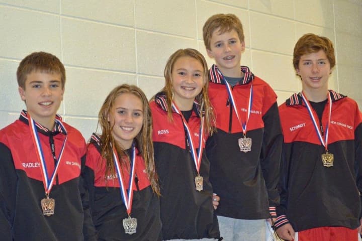 Whirlwind&#x27;s 12-13 year-old divers take the medal stand. Left to right are Kevin Bradley, Anne Farley, Claire Ross, Owen Stevens and Wiley Schmidt.