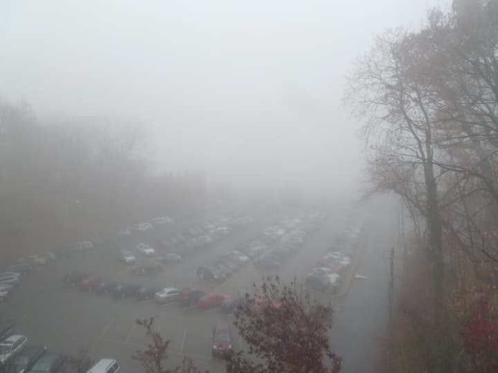 A view from the Warburton Avenue Bridge in Hastings on Thursday morning -- normally a great view of the Palisades and the Metro-North train station obstructed by dense fog.