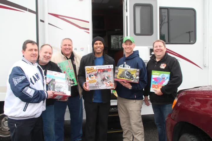 Members of the Pirate Toy Fund donated over 400 toys to Mariano Rivera and the Refuge of Hope Church.