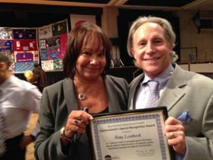 Yonkers&#x27; Tony Lembeck with Susan Wayne, chief executive officer of Family Services of Westchester