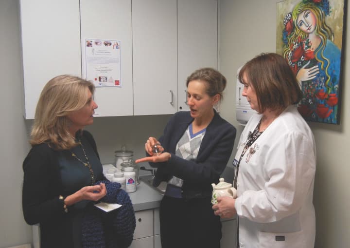 Cindi Bigelow, president and CEO of Bigelow Tea, visits naturopathic physician Dr. Veronica Waks and patient care coordinate Pat Poniros at the Norma F. Pfriem Breast Care Center.
