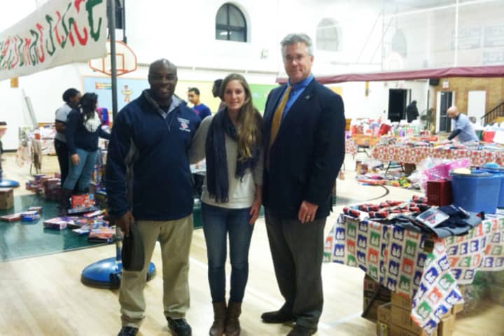 Pictured from left are, Grizzlies Coach Bernie Armstrong, McGivney Community Center Program Coordinator Sarah Motta and State Rep. John Shaban.