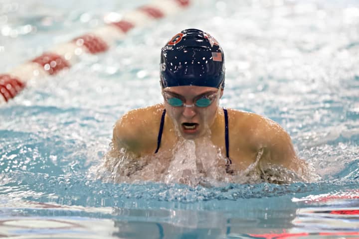 Brooke Collins swims to one of her five victories in the 15-and-over division.