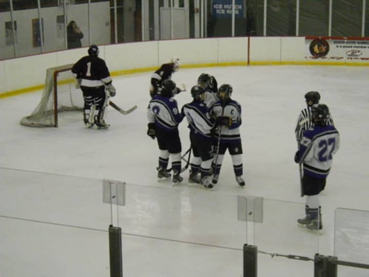 C.J. Tozzo is the new coach of the New Rochelle High School hockey team. 