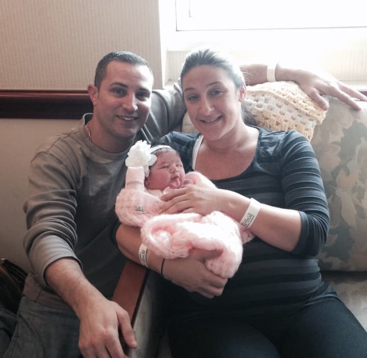 Parents John and Brooke Magnotta  of West Harrison, N.Y., hold Gianna, the first baby born at Greenwich Hospital in 2014.