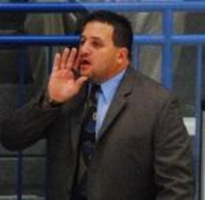 The head coach of the Danbury Whalers faces harassment charges.