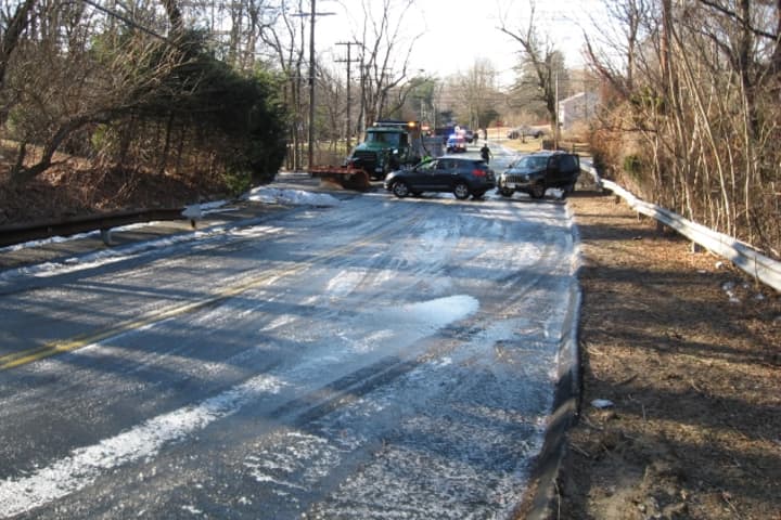 A large patch of ice caused three accidents, including one involving a Public Works truck, on Flax Hill Road in Norwalk Thursday.