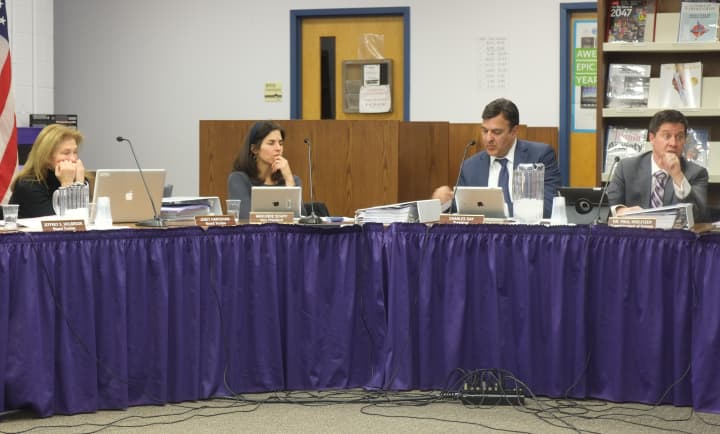Katohan-Lewisboro School Superintendent Paul Kreutzer (right) talks redistricting with the school board. 