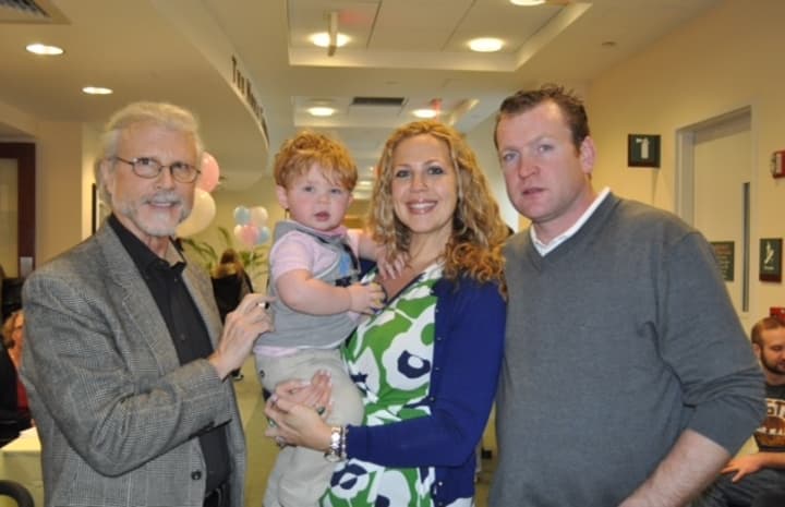 Expectant parents Deirdre Callahan and Vincent McManus (right) brought along granddad Daniel Callahan and son, Donovan to the Pregnancy Primer. The Bronxville couple are expecting their second child in May.
