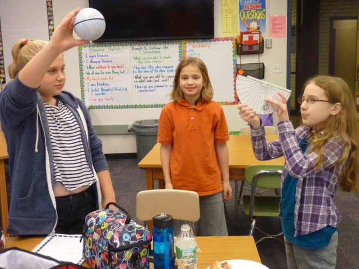 Sixth-grade students in John Jay Middle School take part in World MOON project.  