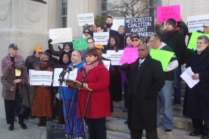 Guisela Marroquin of the Lower Hudson Valley Civil Liberties Union speaks at a rally outside the Westchester County offices in White Plains on police reform.