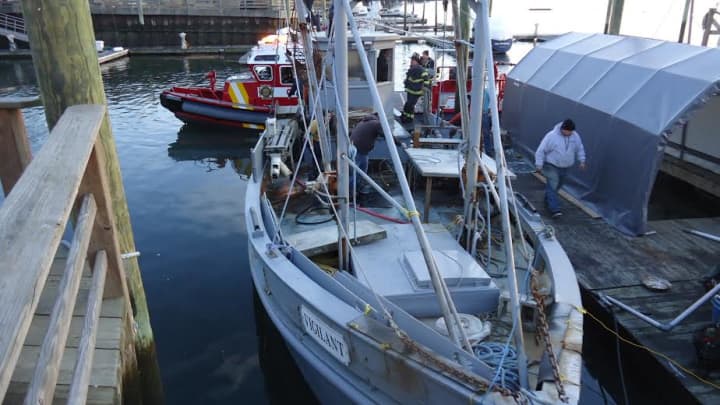The fire is reported on a 42-foot oyster boat called The Vigilant at Norm Bloom &amp; Son Oyster Company in East Norwalk. 