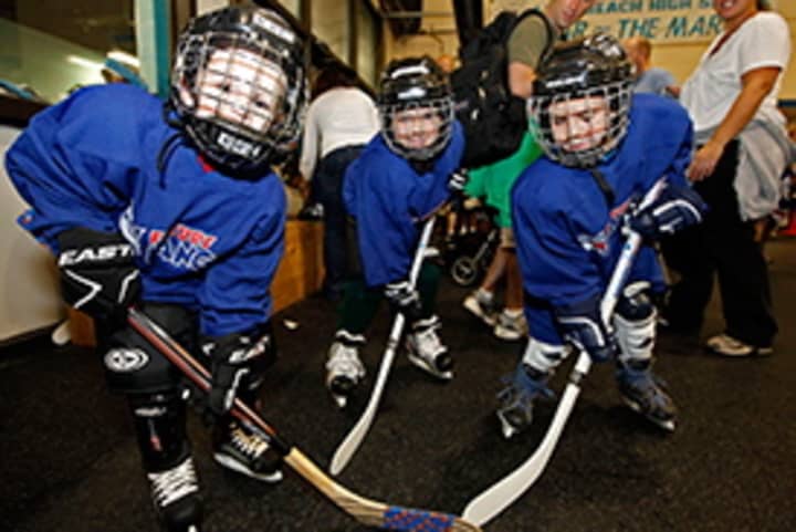 Kids 10 and under can get a free hockey lesson on Wednesday.