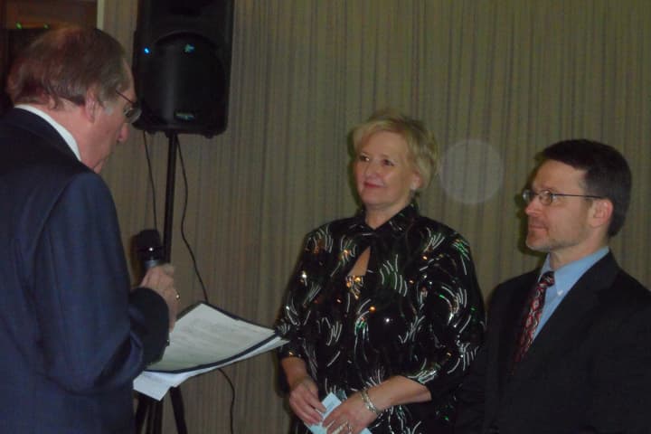 Diane Cummins, left, and J. Philip Faranda are installed as presidents of their respective organizations at the gala.