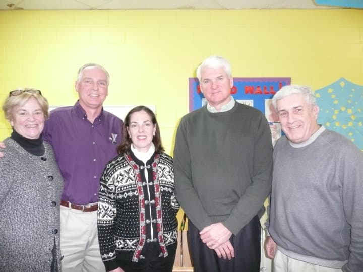 From left, new director Judy Higby, Y Executive Director Bob McDowell, new directors Connie OConnell and Roger Schwanhausser, Y board President Howard Steinberg.