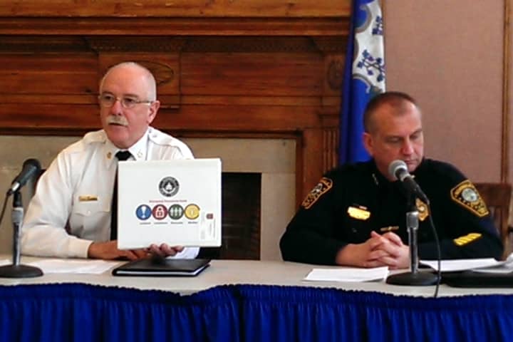 Norwalk Fire Chief Denis McCarthy and Police Chief Thomas Kulhawik discuss new school safety plans at City Hall Thursday.