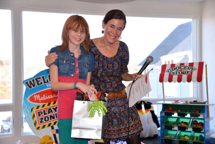 Melissa Bernstein with Raini McCarthy, age 11, winner in the 9-12-year-old category of the 2013 Toy Makers II Design Competition